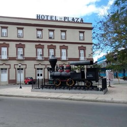colonial facade with hotel sign
