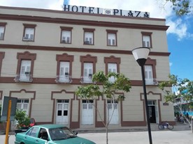 colonial facade with hotel sign