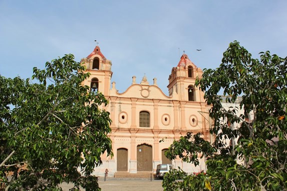 colonial church facade and plants around