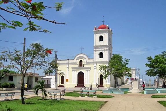 small park with colonial church