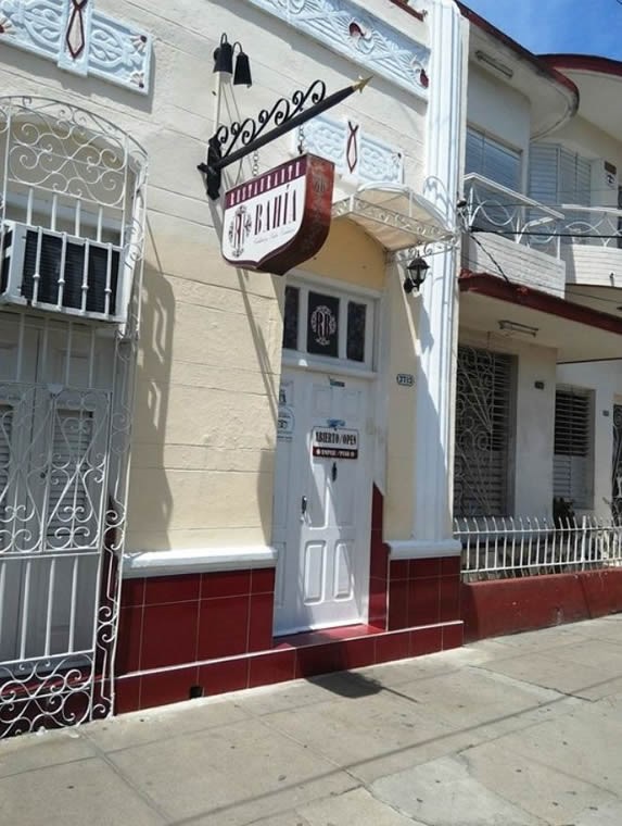 restaurant facade with hanging sign