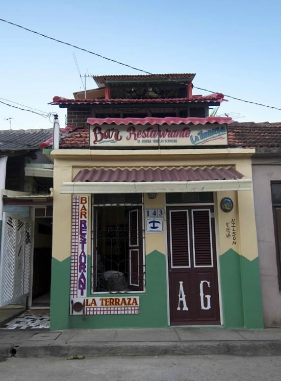 restaurant facade with posters