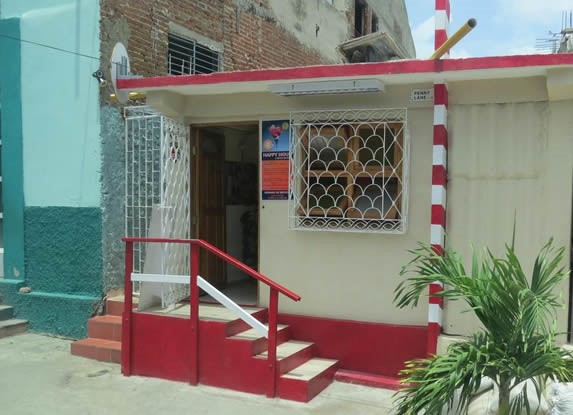 Facade with small sign.