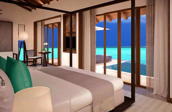 one bed room with windows and sea view