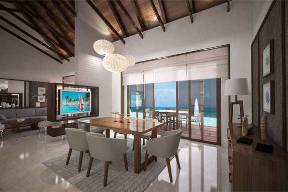 living room with dining room and sea view