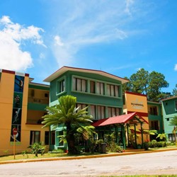 Hotel facade under the blue sky.