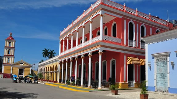 square with colorful colonial buildings