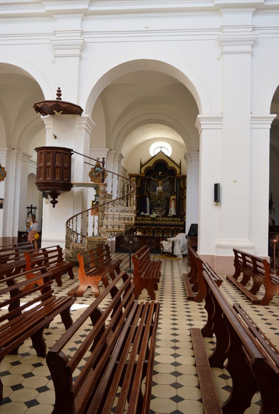 Interior of the church with religious furniture.