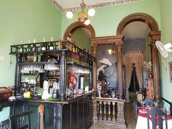 interior with small bar and wooden furniture