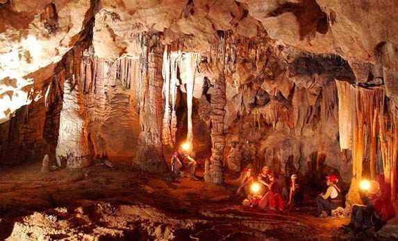 interior of the cave surrounded by stalactites