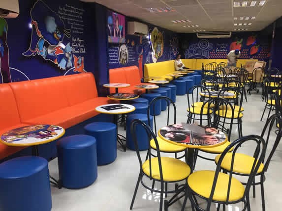 Yellow furniture in the interior of the restaurant