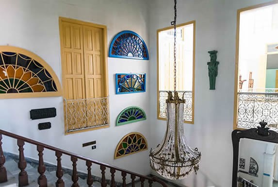 marble stairs and stained glass windows on display