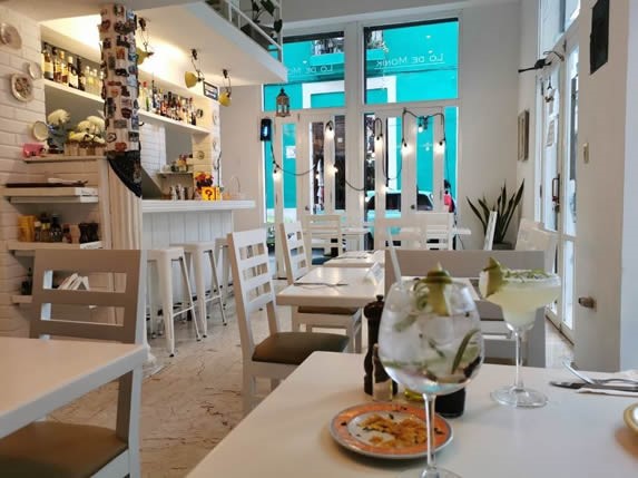 White furniture in the interior of the restaurant