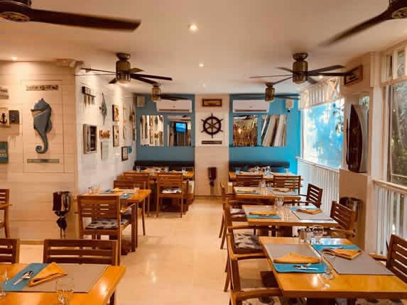 Wooden furniture in the interior of the restaurant