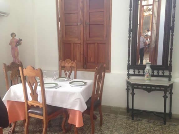 wooden furniture with table linen inside