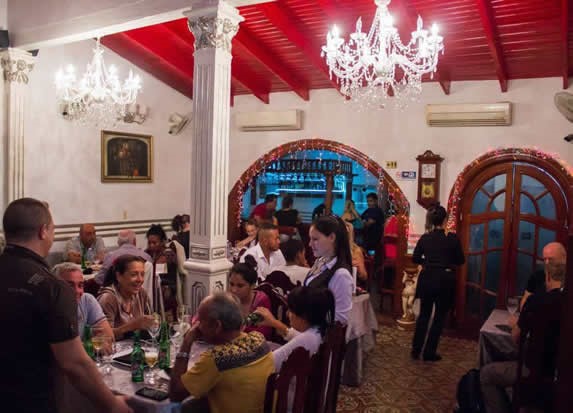 customers inside the restaurant having dinner