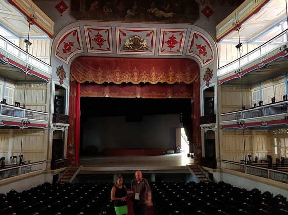 stage view with red and yellow curtain