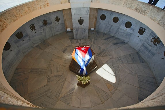 Marble tombstones in round structure.