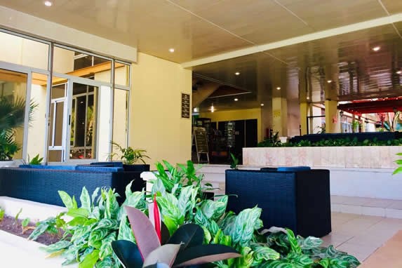 lobby entrance with furniture and greenery