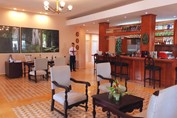 lobby with antique furniture and wooden bar