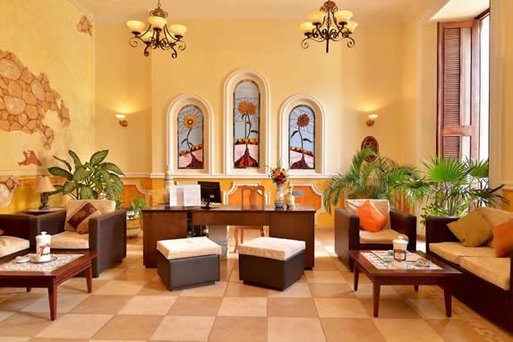 lobby with wooden furniture and stained glass