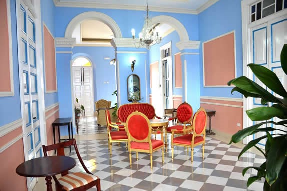 lobby with antique furniture and plants