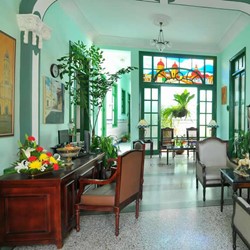 lobby with antique furniture and stained glass