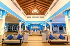 lobby with wooden ceiling and furniture