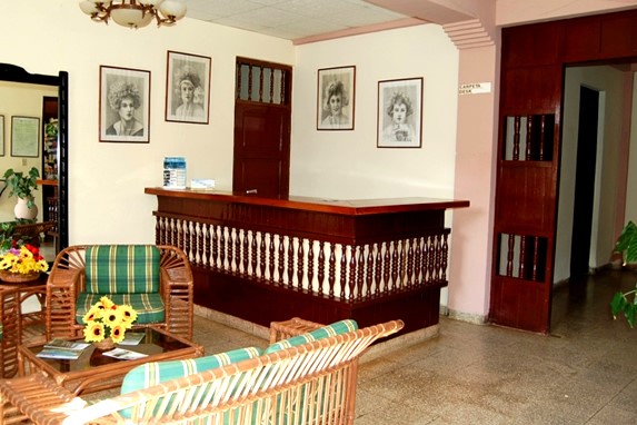 lobby with wooden reception desk and furniture