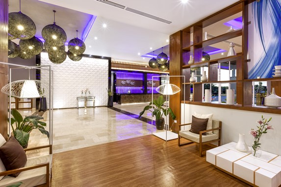 lobby with wooden floor and reception desk