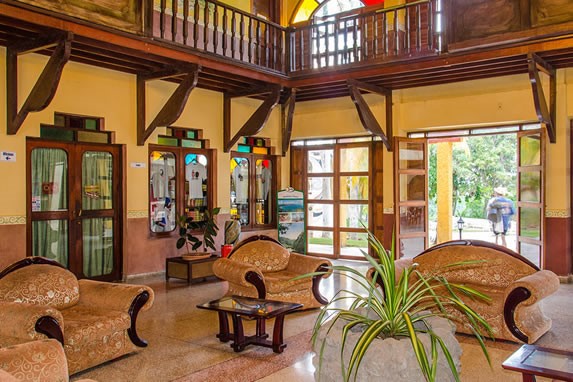 lobby with antique furniture and plants