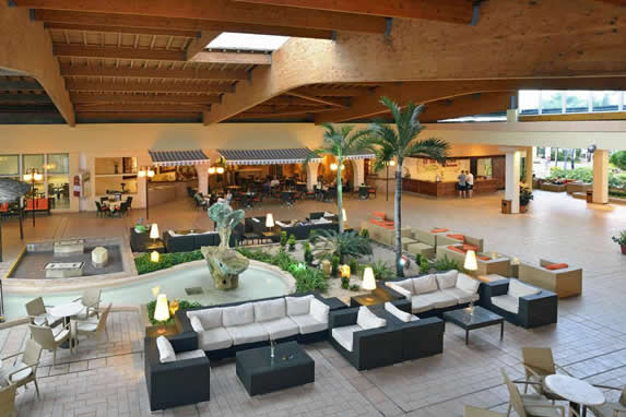 lobby with furniture and decorative fountain