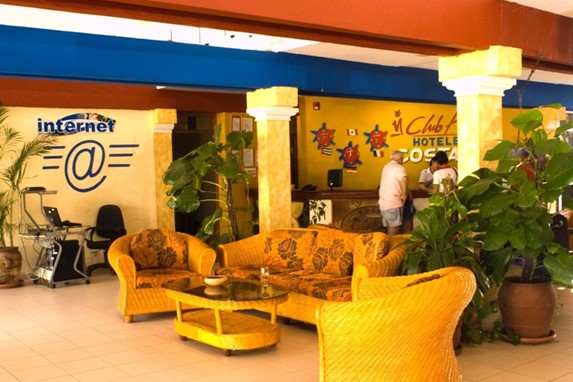 lobby with furniture and decorative plants