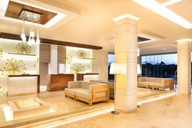 lobby with wooden reception and furniture