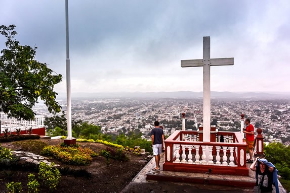 cement cross on top of the mountain