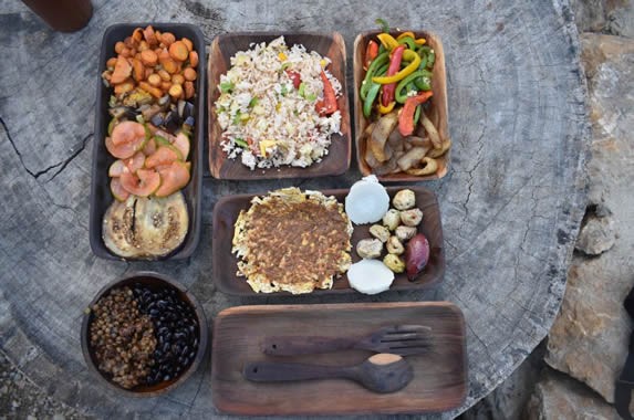 rustic table served with restaurant dishes