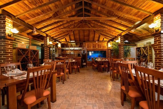 Wooden furniture in the restaurant La Fontana