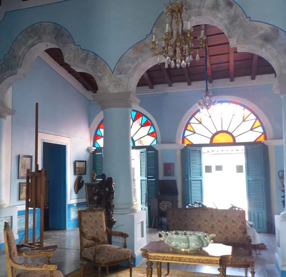 room with antique furniture and stained glass