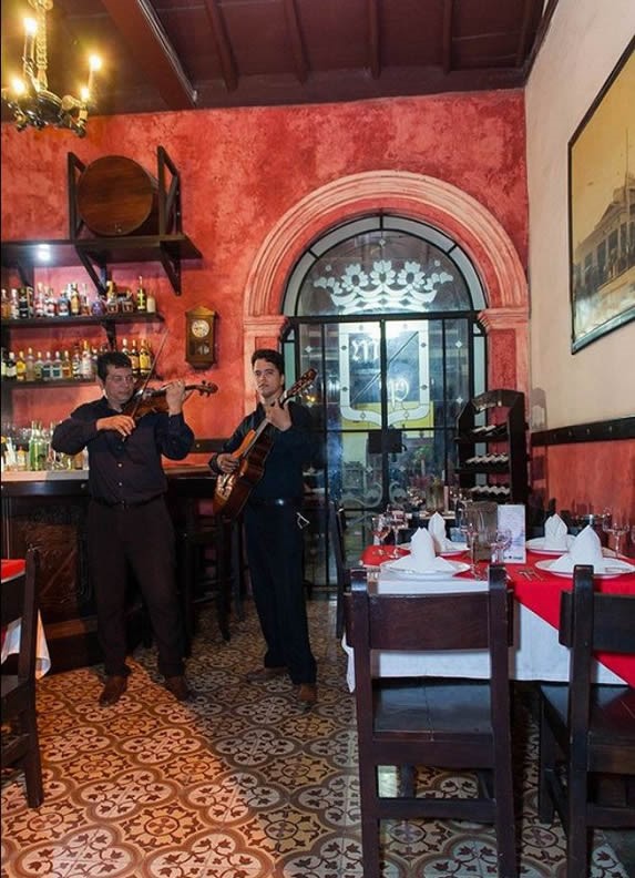 musicians playing inside the restaurant