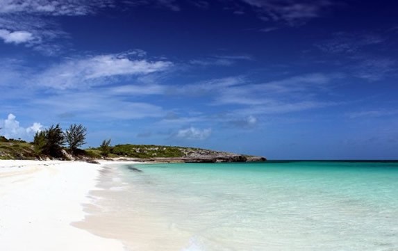 beach with crystal clear waters and golden sands