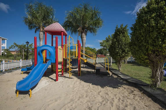 colorful and small playground with sand