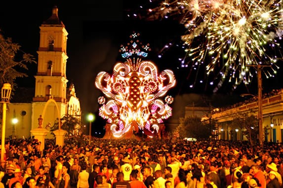 illuminated festival float in the crowded square