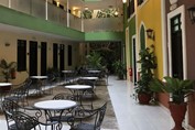 courtyard with iron furniture and plants