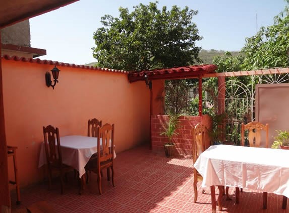 restaurant courtyard with wooden furniture