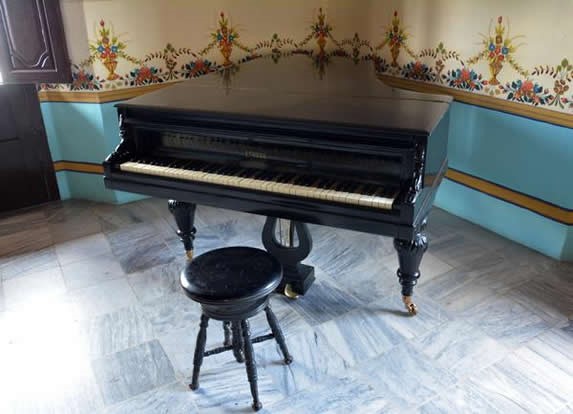 old piano on display