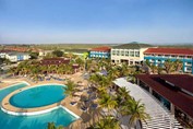 aerial view of the pool surrounded by palm trees