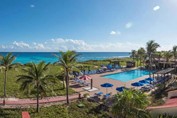 aerial view of the pool surrounded by sun loungers