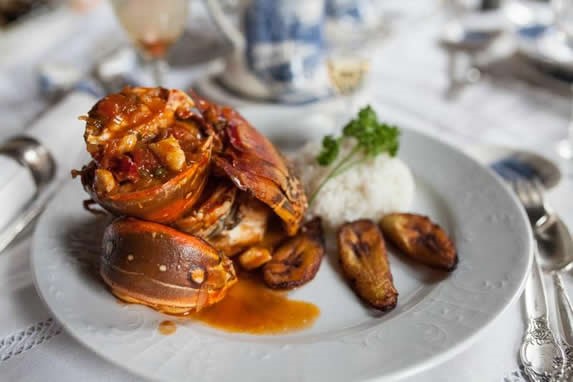Lobster served in old crockery.