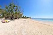 beach with crystal clear waters and golden sands