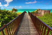 wooden bridge on the way to the beach